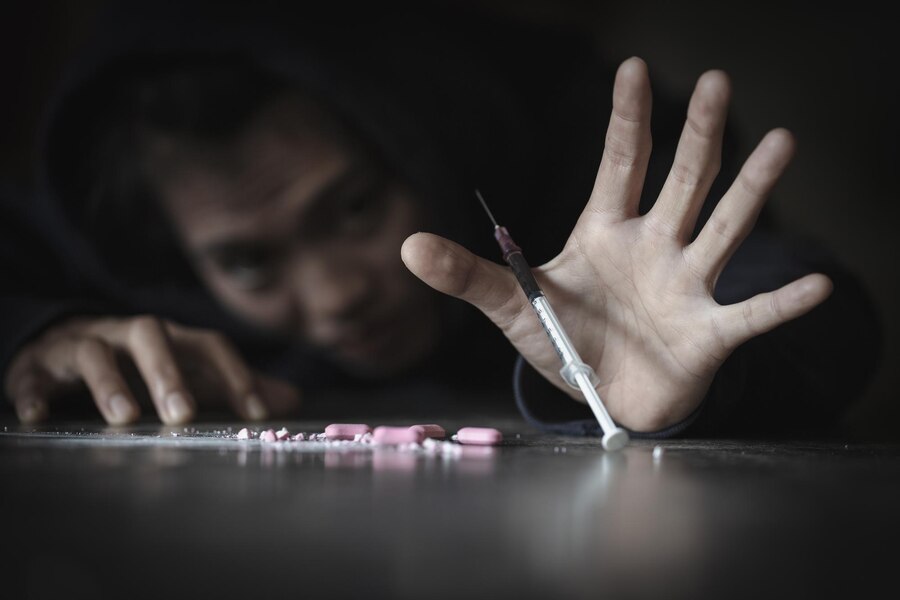 close-up-hand-holding-leaf-table_1048944-10313762